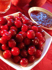 Fresh cherry in bowl on table