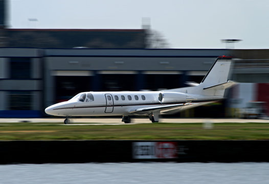 corporate jet taking off