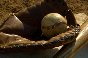 Vintage baseball and bat on base