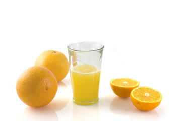 a fresh glass of orange juice is ready