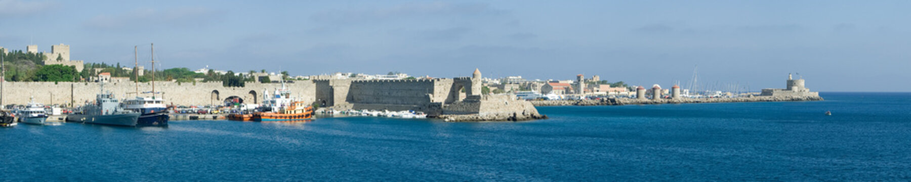 Panoramic view of Rhodes town's harbour (stitched photos)