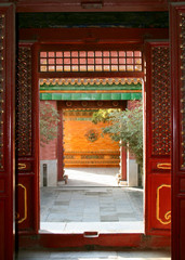 Looking through doors in the Forbidden City in Beijing