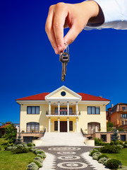House owner/real estate agent giving away the keys - obrazy, fototapety, plakaty