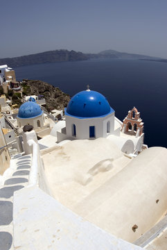 Fototapeta santorini classic church with greek island view thira greece