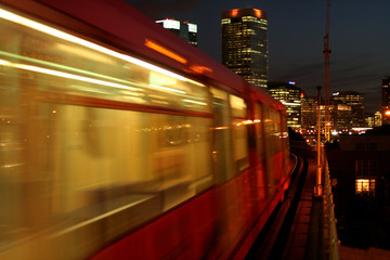 train arriving on platform at night