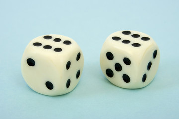 Two dices on blue background