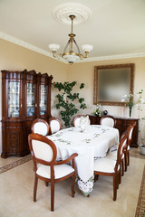 Table and chairs in a room of the smart house