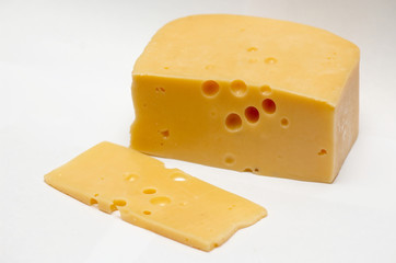 A piece of cheese on a white background