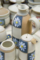 Ceramic handmade cups and jars on the countryside market