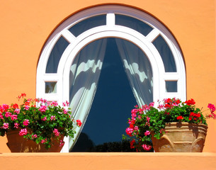 Nice window decorated with flowers - 3828507