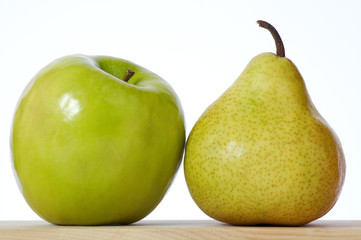 Fresh apple and pear close-up. Isolated on white.