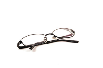 glasses on a white paper