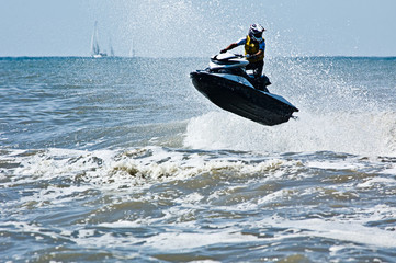 extreme  jet-ski watersports with big waves