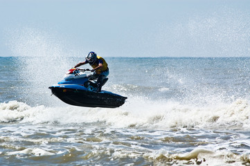 extreme  jet-ski watersports with big waves