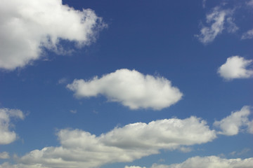 Naklejka na ściany i meble background - blue sky with white clouds high above