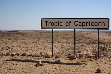 Fotobehang Pancarte Tropic of Capricorn - Désert du Namib - Namibie © Sahara Nature