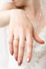 Bride hand closeup. Bright white color.