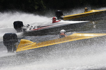 Speed boats in a race