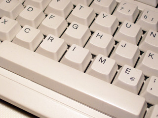 Keys on a computer keyboard spell out the word crime