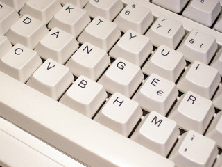 Keys on a computer keyboard spell out the word danger