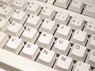 Keys on a computer keyboard spell out the word fraud