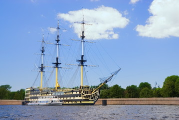 Modern boat and old sailing yacht