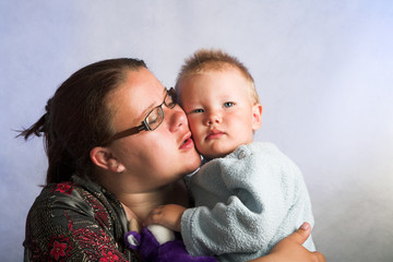happy childhood - mother with son in the studio