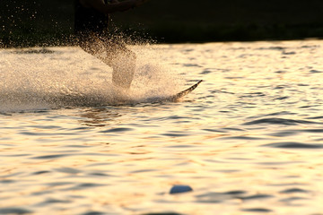 water skiing in sunset