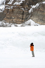 Solitary figure on a glacier, Athabasca, Canada