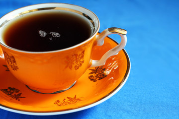 Elegant tea cup with freshly made tea.