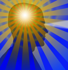 Obraz premium Beams radiate from a sillouette of a head