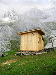 mountains behind a hut