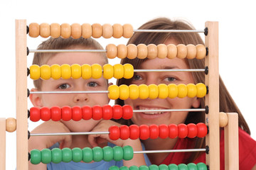 mother and 5-6 years old boy with big abacus isolated