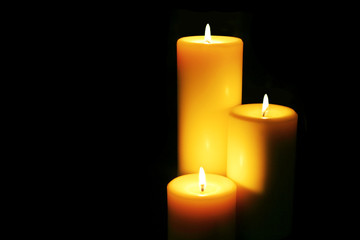 Three candles light the darkness..