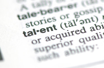 A macro shot of the word "Talent" from the dictionary