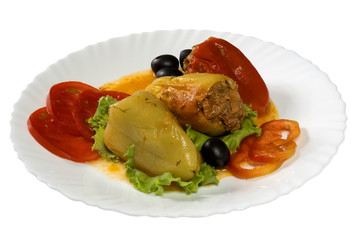  stuffed pepper with vegetables on a white plate