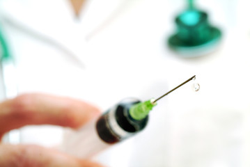 Medical syringe needle drop