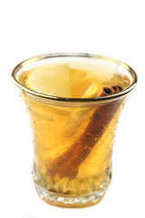 tea with lemon and cinnamon in glass cup