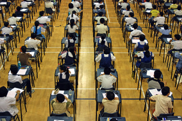 student having a test in the school halls 