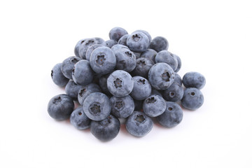 pile of fresh blueberries isolated on white