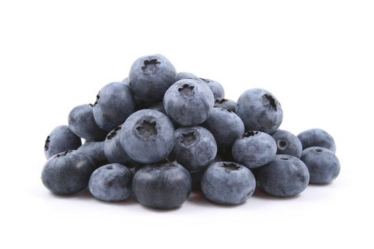 pile of fresh blueberries isolated on white