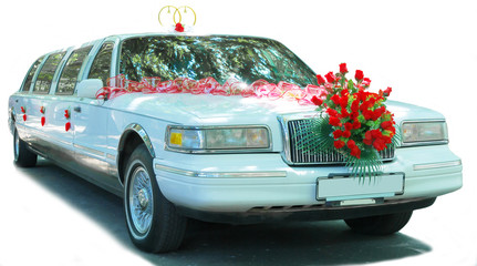 Wedding car   decoreted by flowers and golden rings