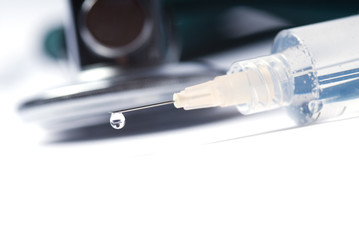 Stethoscope and a syringe