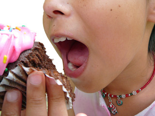 Child Eating Cupcake