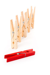 Clothespin with white background, concept of teamwork