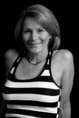 Pretty mature woman in striped blouse