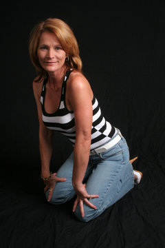 Pretty Mature Woman Kneeling