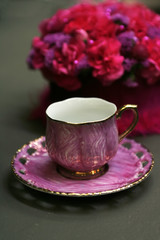 classic tea cup with floral composition