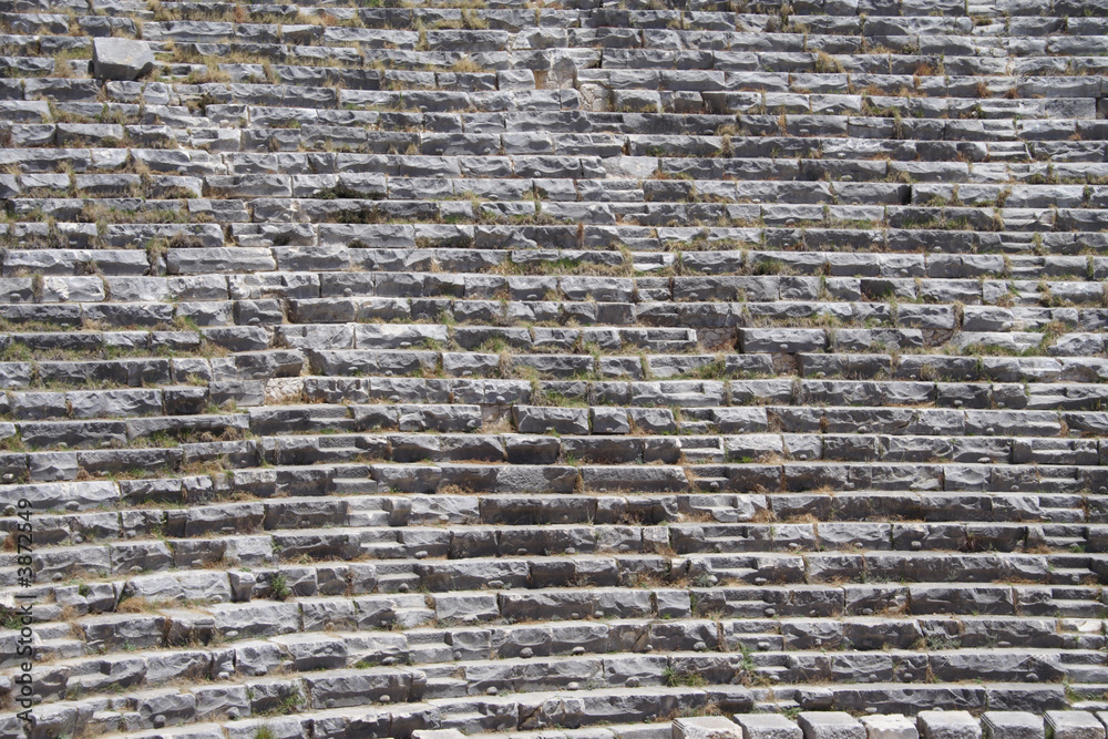 Wall mural lines made by amphitheatre seats.