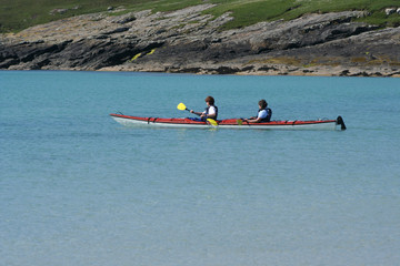two women kayaking